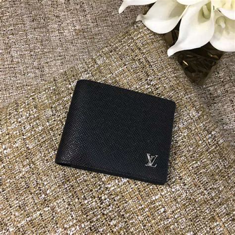 louis vuitton taiga wallet products for sale 